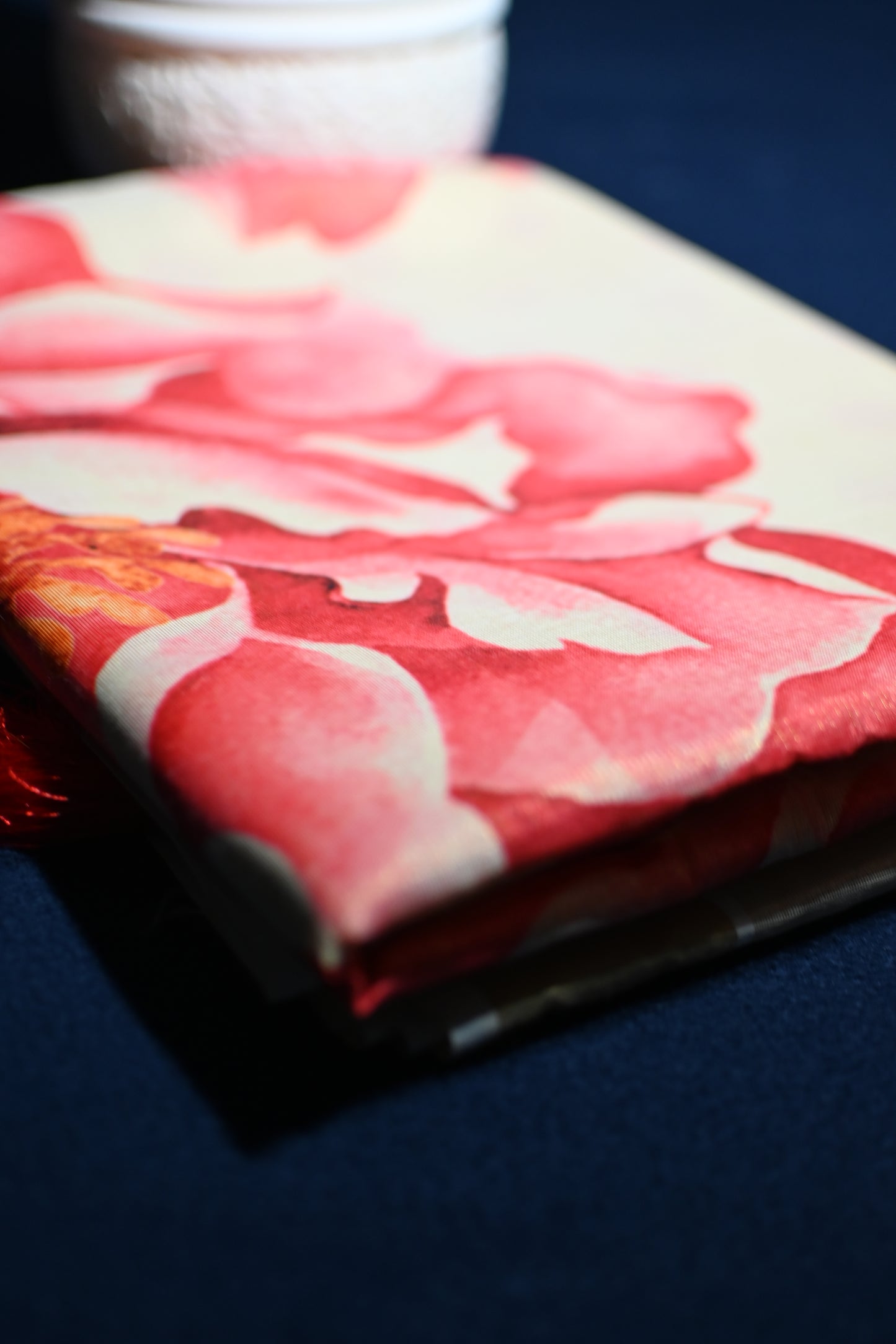 Tissue Saree with Coral Floral Print & Tassel Pallu