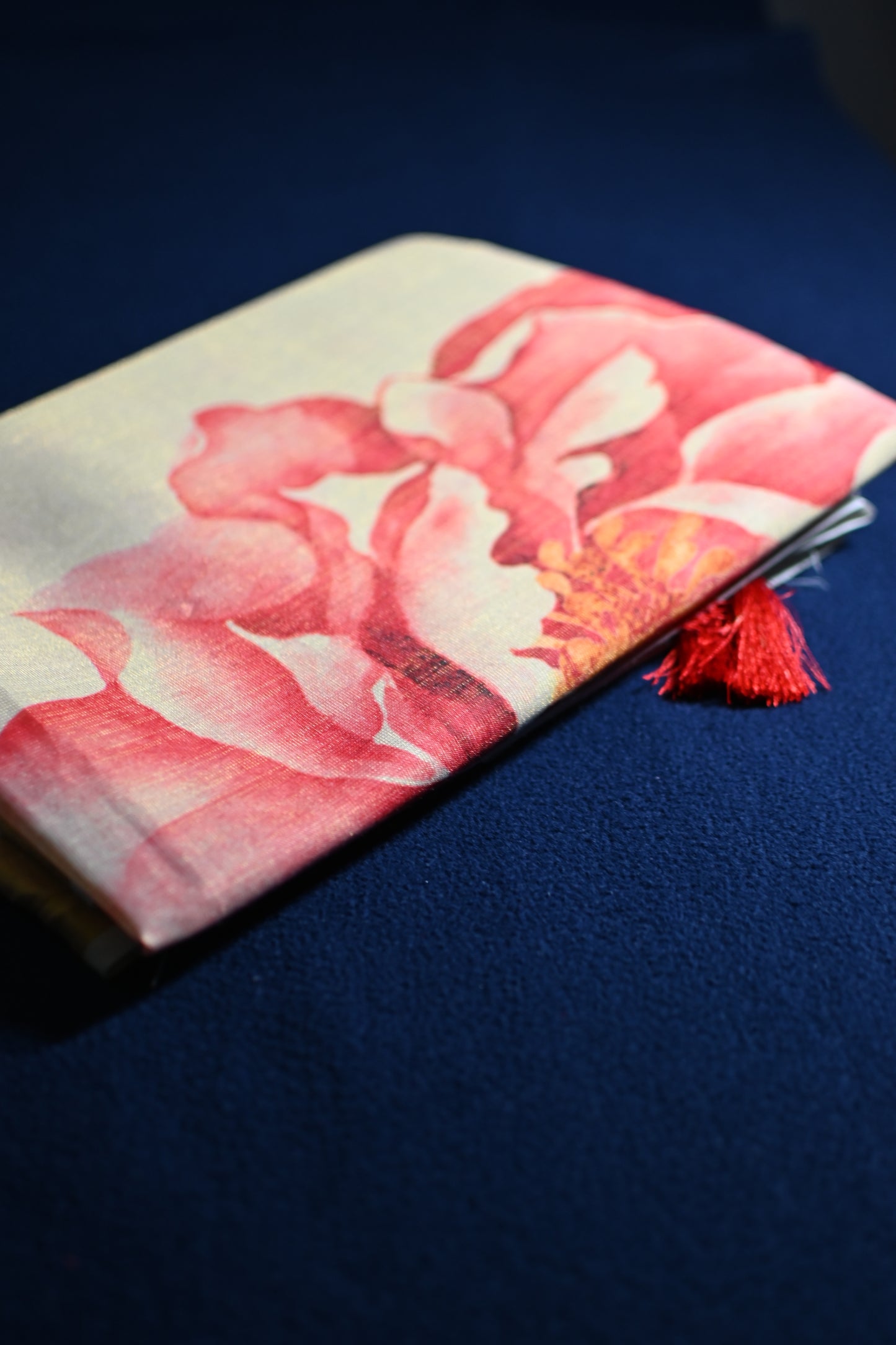 Tissue Saree with Coral Floral Print & Tassel Pallu